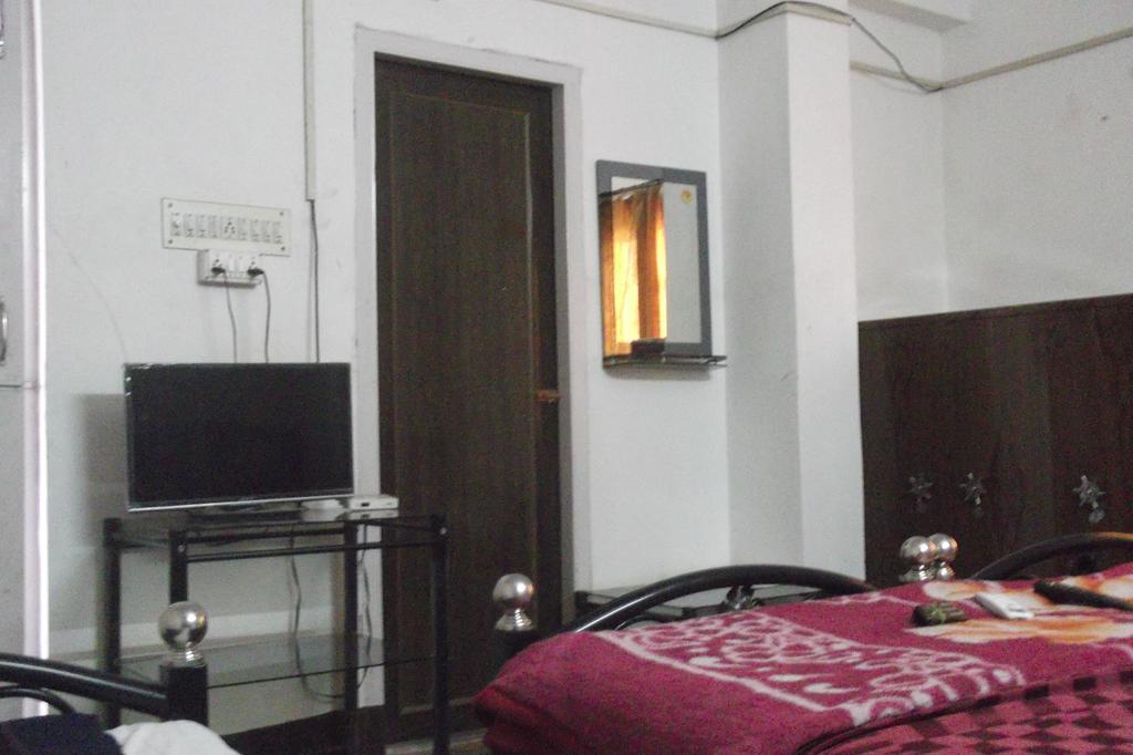 كولكاتا Megacity Inn الغرفة الصورة